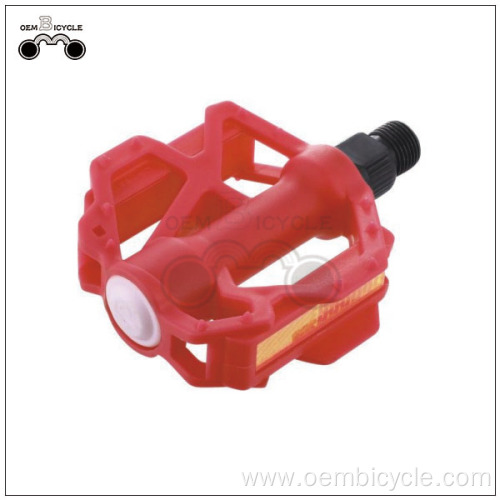 Red exercise kids bike front pedals